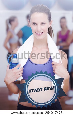 The word start now and female holding water bottle with fitness class in background against badge