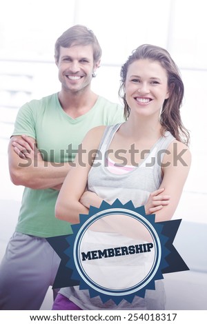 The word membership and portrait of a fit couple with arms crossed in exercise room against badge