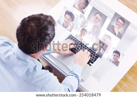 Creative team going over contact sheets in meeting against profile pictures