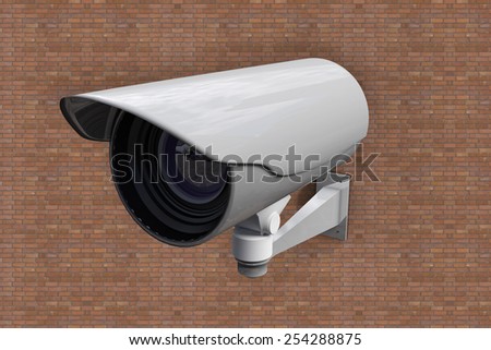 CCTV camera against brick wall