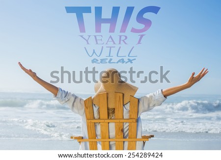 Woman relaxing in deck chair by the sea against this year i will relax