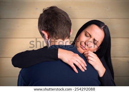 Woman breaking up with boyfriend against bleached wooden planks background