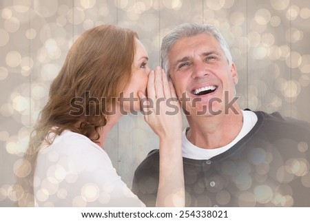 Woman telling secret to her partner against light glowing dots design pattern