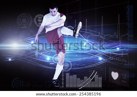Football player in white kicking against blue lines and lights on black background