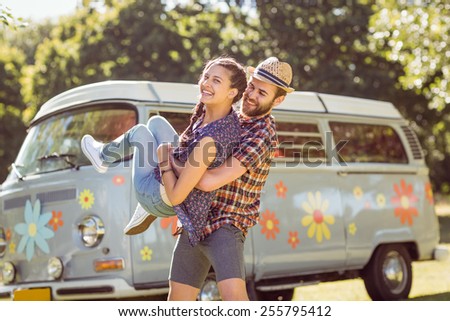 Hipster couple having fun together on a summers day