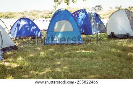 Blue tents in the campsite at a music festival