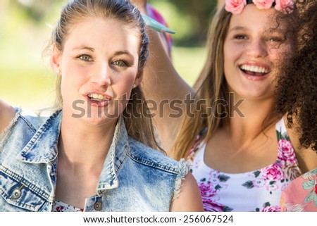 Excited music fans at festival on a summers day