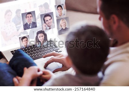 Editor holding tablet and smiling as team works behind her against profile pictures