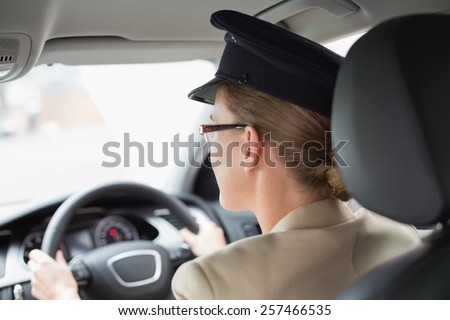 Chauffeur looking at the road in the car