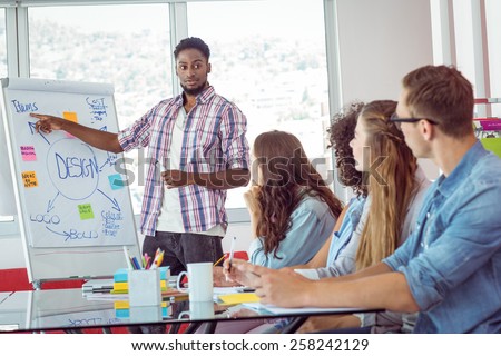 Students looking at white board at the college