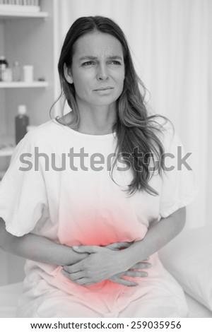Woman having terrible belly ache