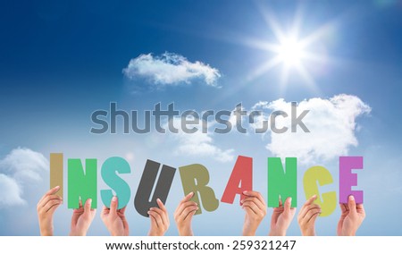 hands holding up insurance against bright blue sky with clouds