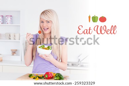 The word eat well against blonde smiling female eating her salad