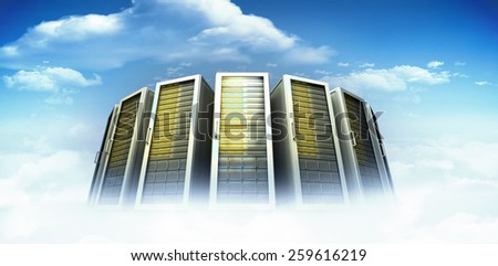 Server towers against bright blue sky with clouds