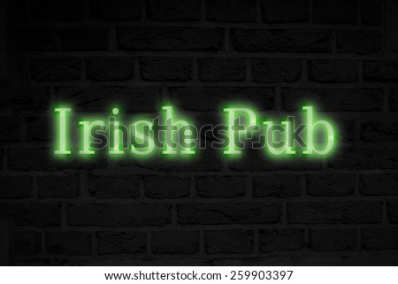 irish pub sign against black wood