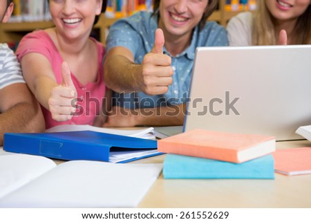 Students working together in the library at the university
