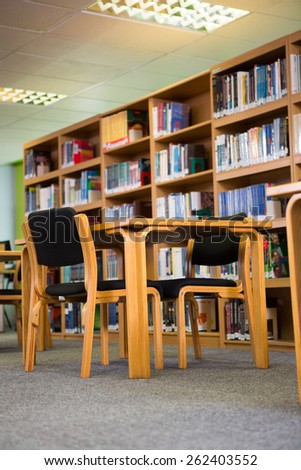Volumes of books on bookshelf in library at the university