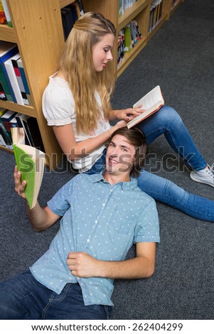 Students reading together in the library at the university