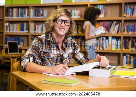 Student studying in the library at the university