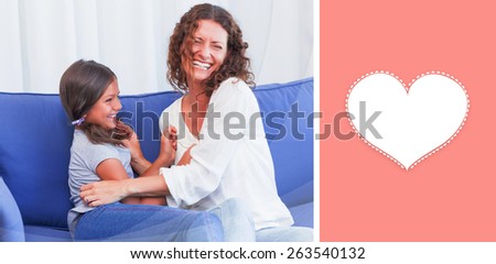 mothers day greeting against happy mother and daughter having fun