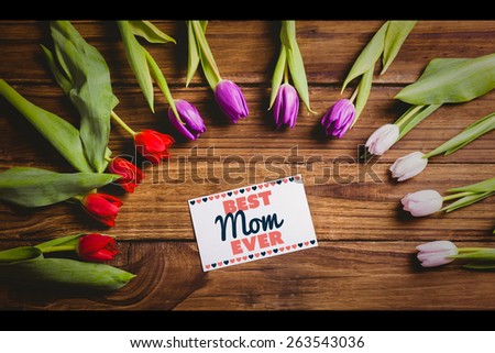 best mom ever against tulips with card