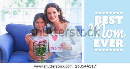 best mom ever against cute girl offering flowers and card to her mother