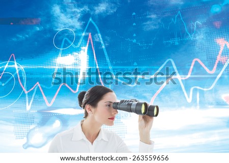 Business woman looking through binoculars against blue sky