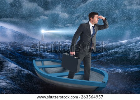 Businessman in boat against stormy sea with lighthouse