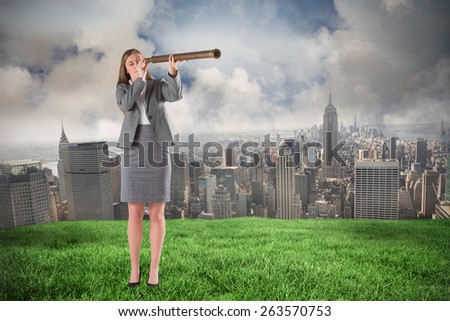 Businesswoman looking through a telescope against cloudy sky over city