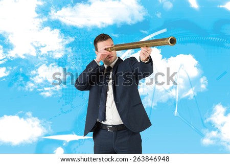 Businessman looking through telescope against stocks and shares