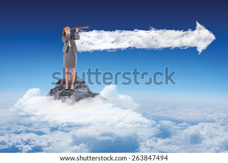 Businesswoman looking through a telescope against cloud arrow