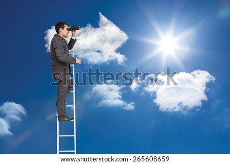 Businessman standing on ladder against cloud arrow