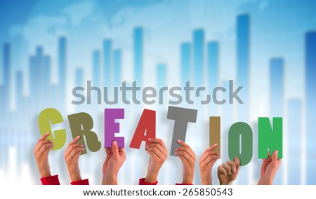 Hands holding up creation against global business graphic in blue