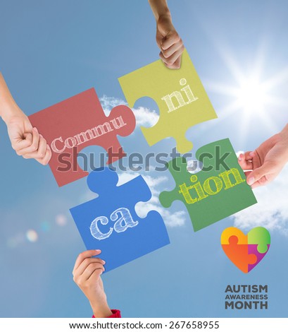 autism awareness month against bright blue sky with clouds