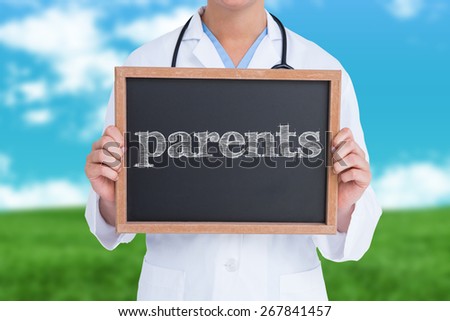 The word parents and doctor showing little blackboard against field and sky