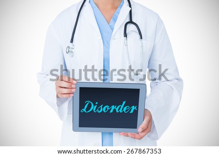 The word disorder against doctor showing tablet pc