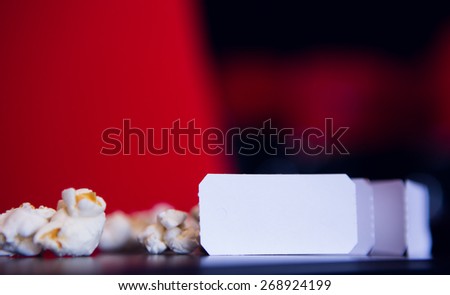 Pop corn and cinema tickets at the cinema