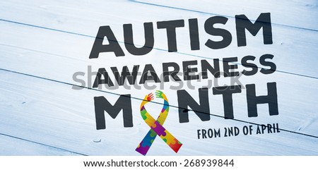 autism awareness month against bleached wooden planks background