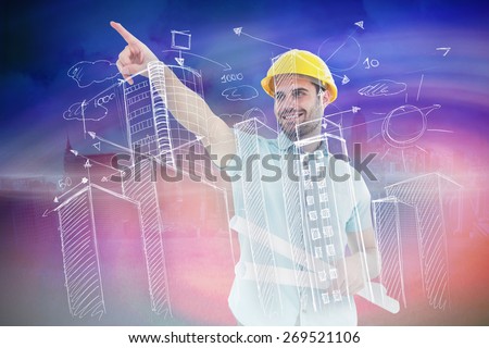 Male architect with blueprints pointing away against cloudy sky over city