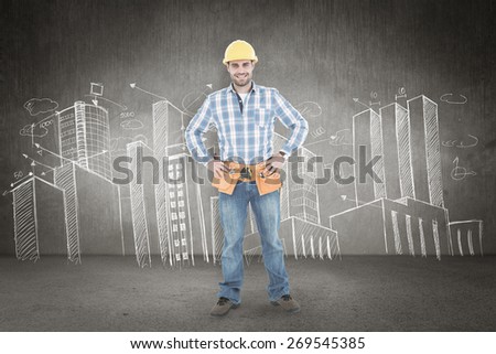 Confident repairman standing with hands on hips against hand drawn city plan