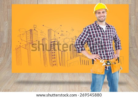 Handyman wearing tool belt while standing hands on hips against composite image of orange card