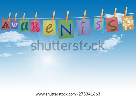 Autism awareness day against digitally generated grey background