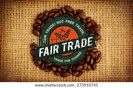 Fair Trade graphic against coffee beans formed into shape