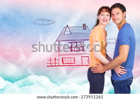 Couple looking at the camera against painted sky