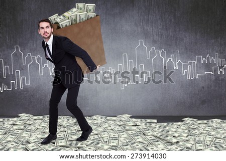 Businessman carrying bag of dollars against hand drawn city plan