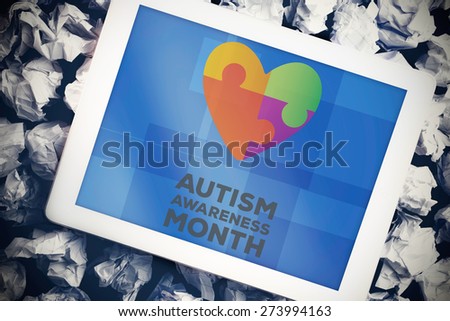 autism awareness month against tablet pc with blue screen