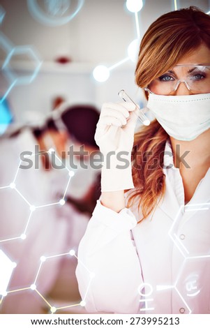 Science formula against scientist woman wearing a mask and holding a test tube