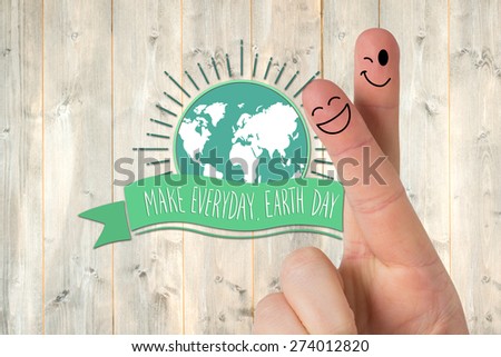 Fingers smiling against pale wooden planks