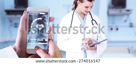 Hand holding smartphone against sterile bedroom