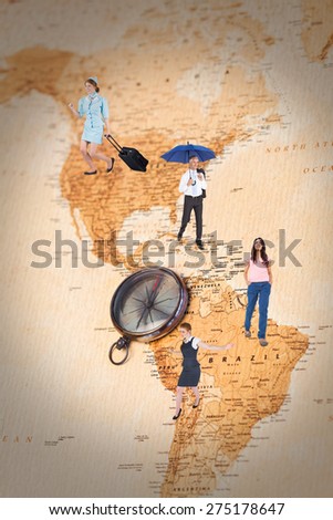 Pretty air hostess pulling suitcase against world map with compass showing north and south america
